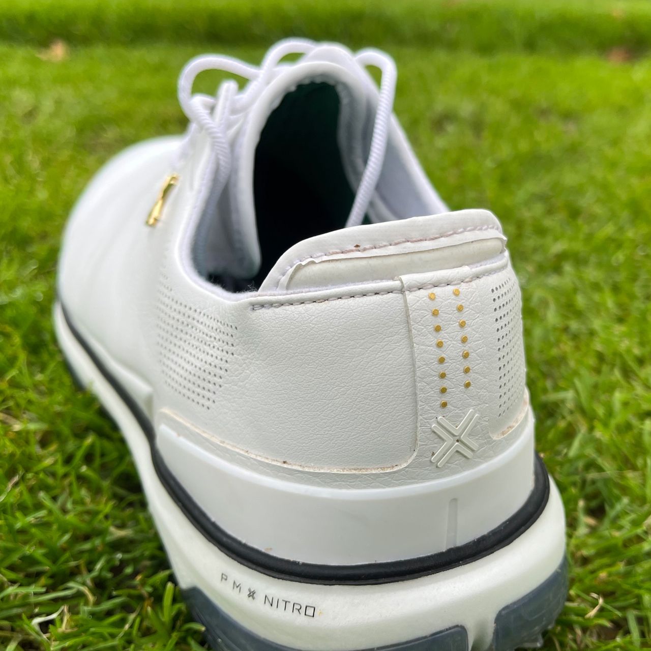 The rear section of the Payntr Eighty Seven SC golf shoe