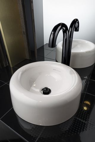 round bathroom basin and black tap, VitrA Liquid range by Tom Dixon