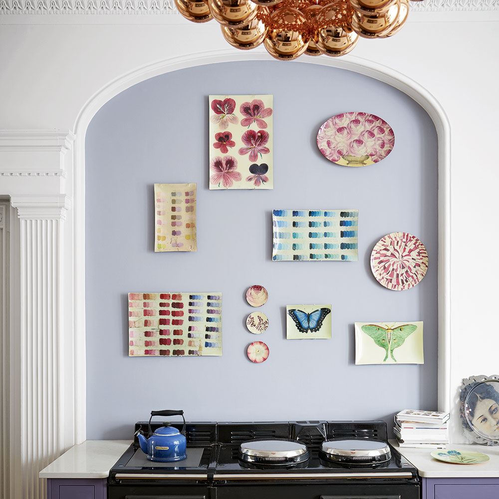 kitchen room with tea pot and painting on wall