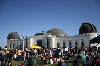 Skywatcher Maxim Senin turned his camera on the crowd of people gathered at Griffith Observatory in Los Angeles to view the annular solar eclipse, May 20, 2012.