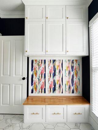 Mudroom with Ikea cabinets and wallpapered panelling