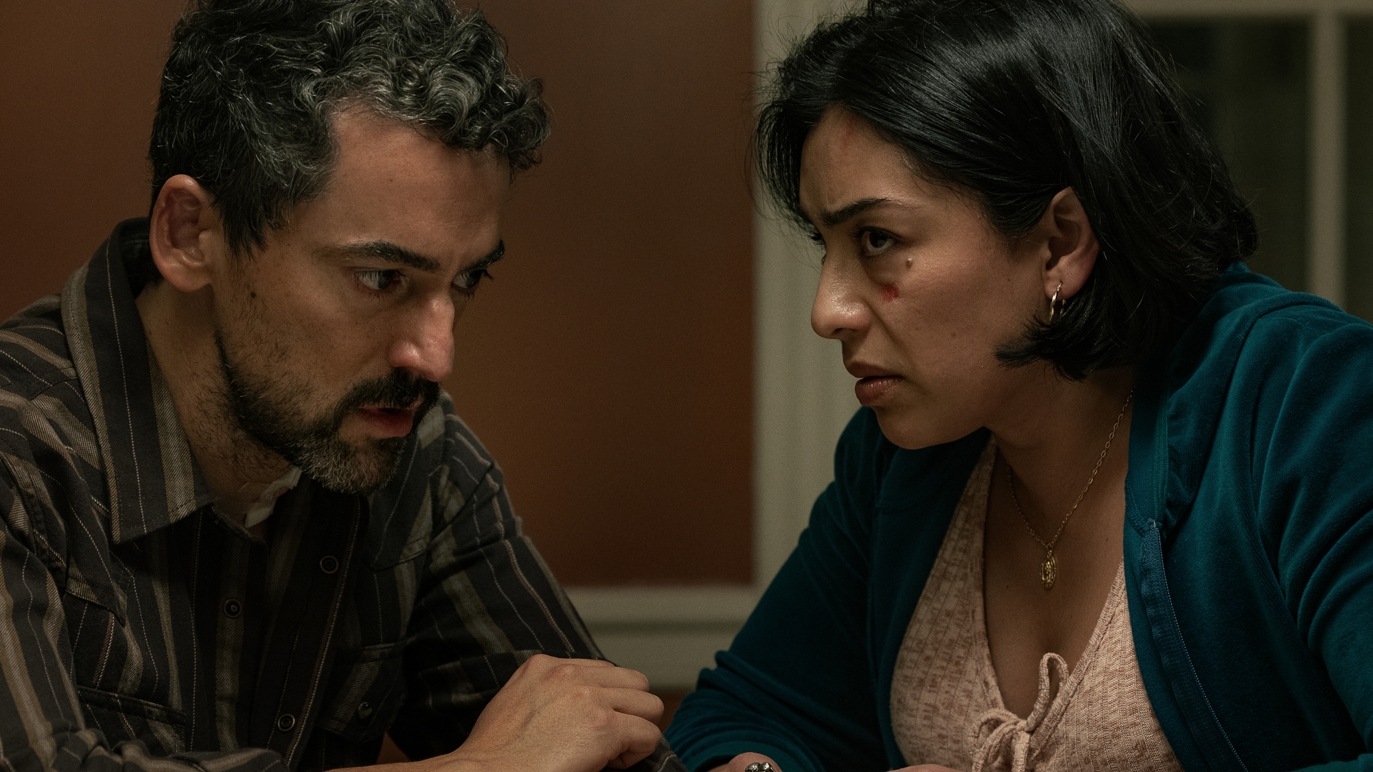 Ramon Valle (Luis Gerardo Méndez) and Cecilia Trujillo (Adriana Paz) discuss the kidnapping of the former's son in Animals.