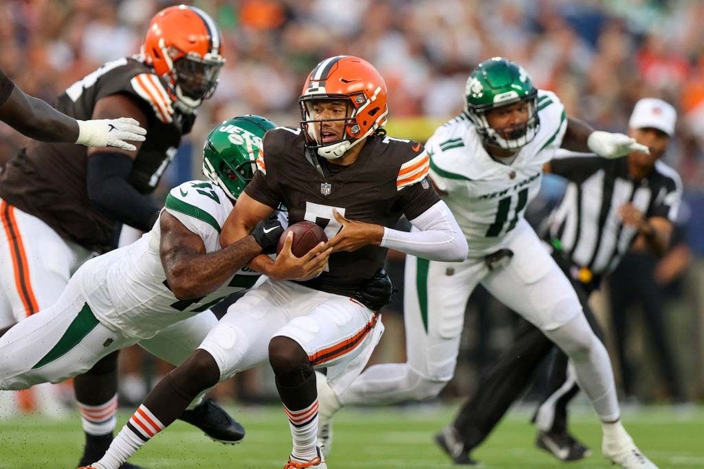 Cleveland Browns quarterback Kellen Mond (7) is sacked by New York Jets defensive lineman Bryce Huff (47) during the first quarter of the National Football League Hall of Fame preseason game between the New York Jets and Cleveland Browns on August 3, 2023, at the Tom Benson Hall of Fame Stadium in Canton, OH. 