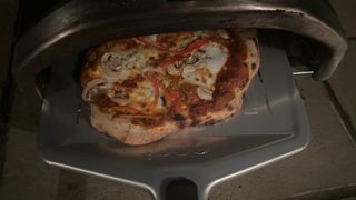using a pizza peel with the ooni fyra