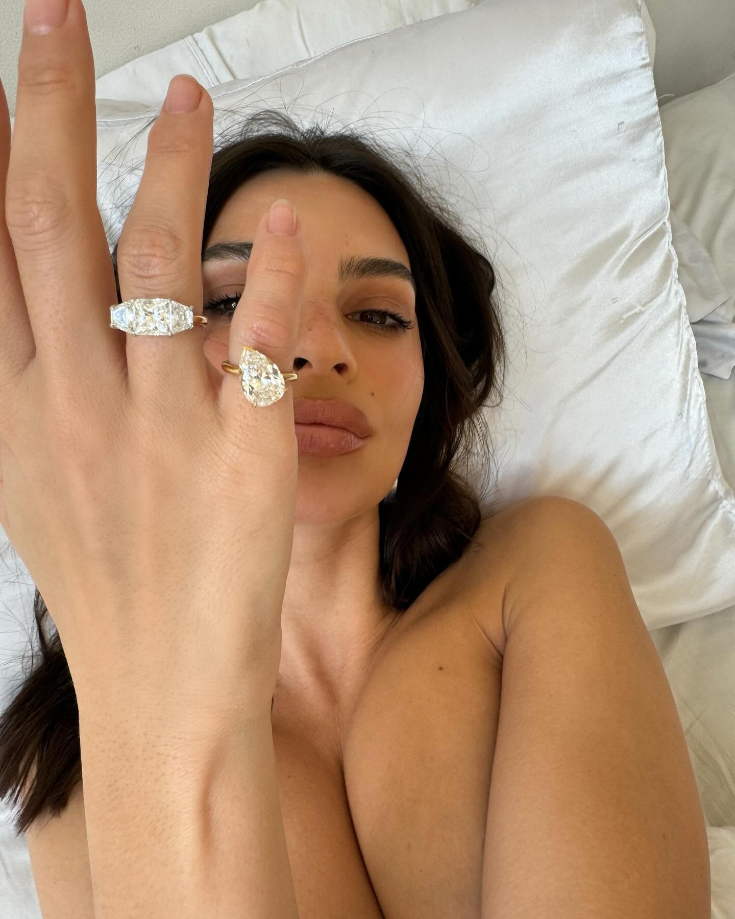Woman wearing diamond pinkie ring