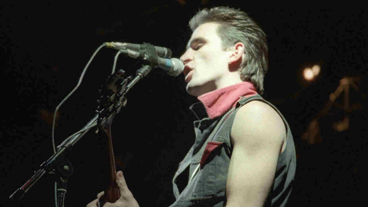 The Clash guitarist Nick Sheppard performing onstage in 1984