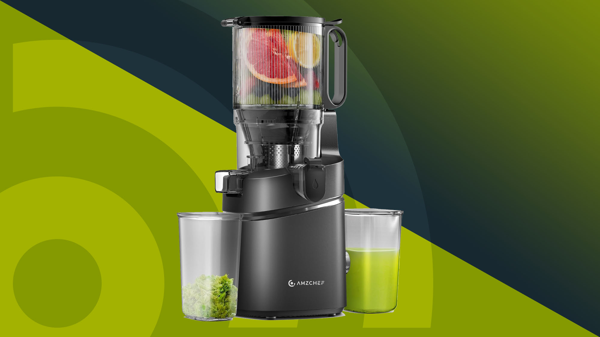 Cold press juicer on green background