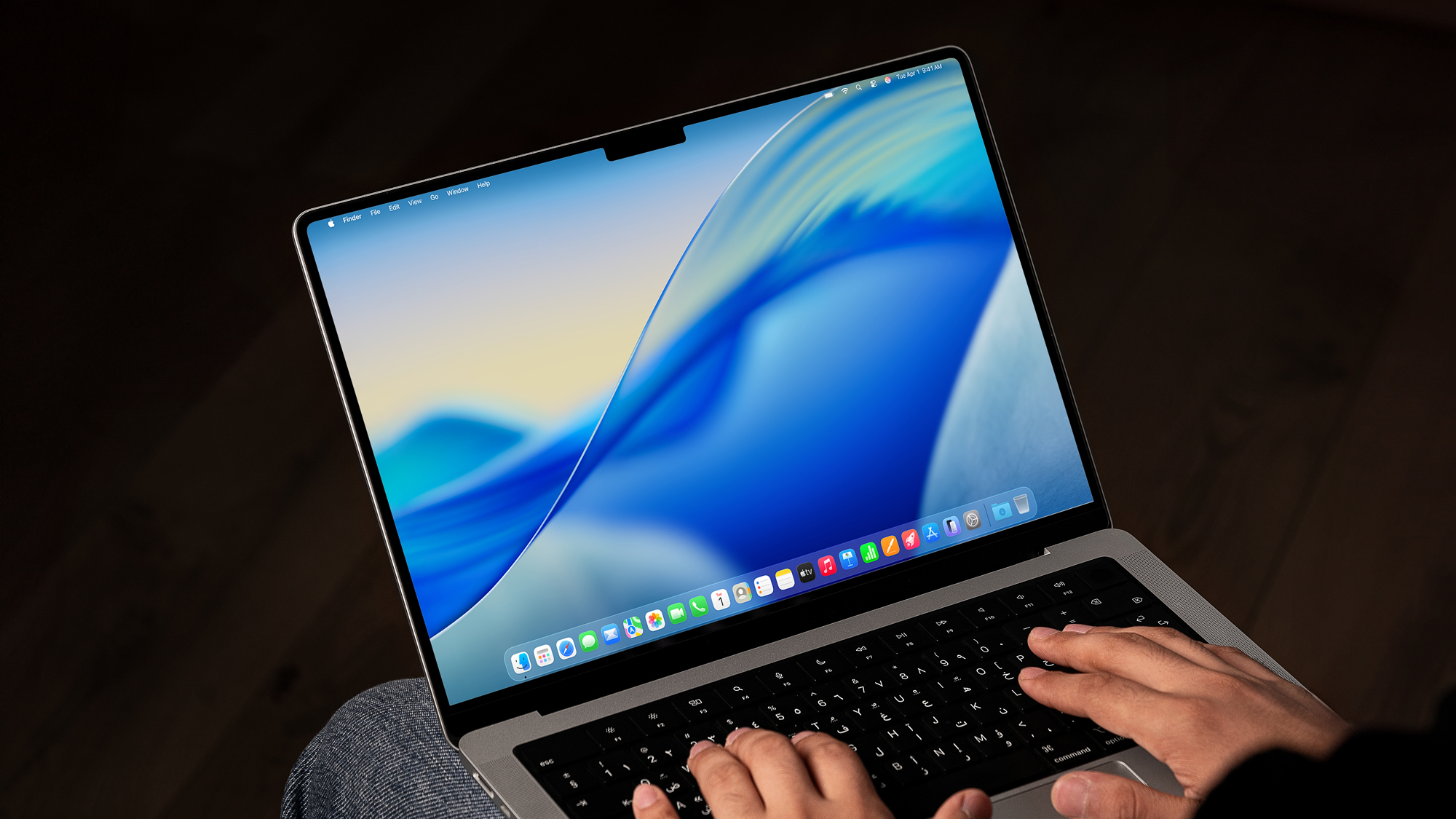 macOS Tahoe 26 desktop screen on an MacBook