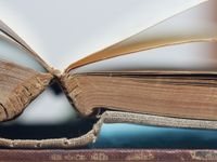 A book with its spine strained.