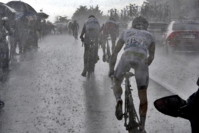 The Tour de France heads through a massive downpour en route to Nimes