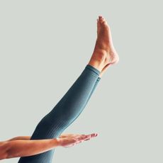 Ballet barre for home: A woman's toes during a barre workout
