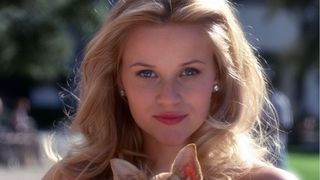 Elle Woods smiles into the camera in Legally Blonde