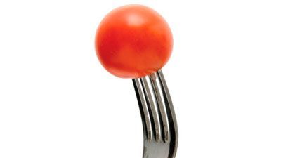 cherry tomato on a fork