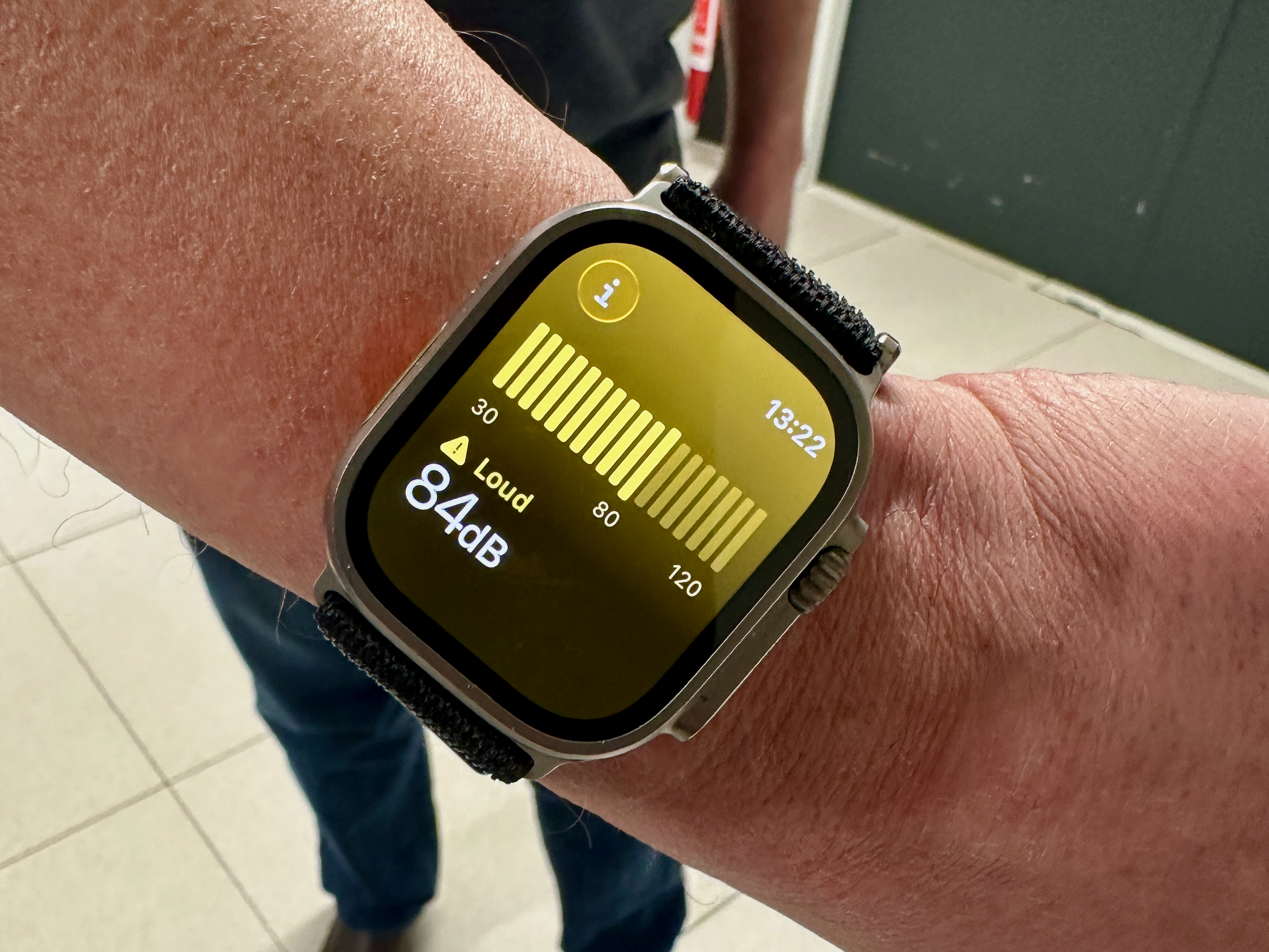 An Apple Watch showing a reading of 84dB in the data center.
