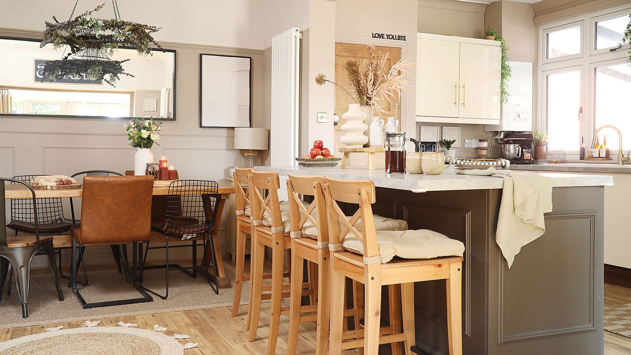 neutral kitchen diner with island and dining table