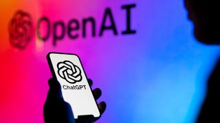 A silhouette of a person holding a phone with the ChatGPT logo on screen in front of an abstract background with the OpenAI logo