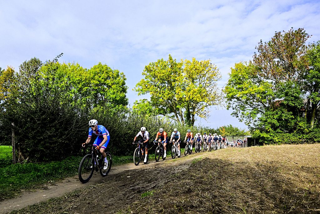 The pack of riders pictured in action during the men elite race at the UCI World Gravel Championships, Sunday 12 October 2025, in Maastricht, The Netherlands. BELGA PHOTO DIRK WAEM (Photo by DIRK WAEM / BELGA MAG / Belga via AFP)