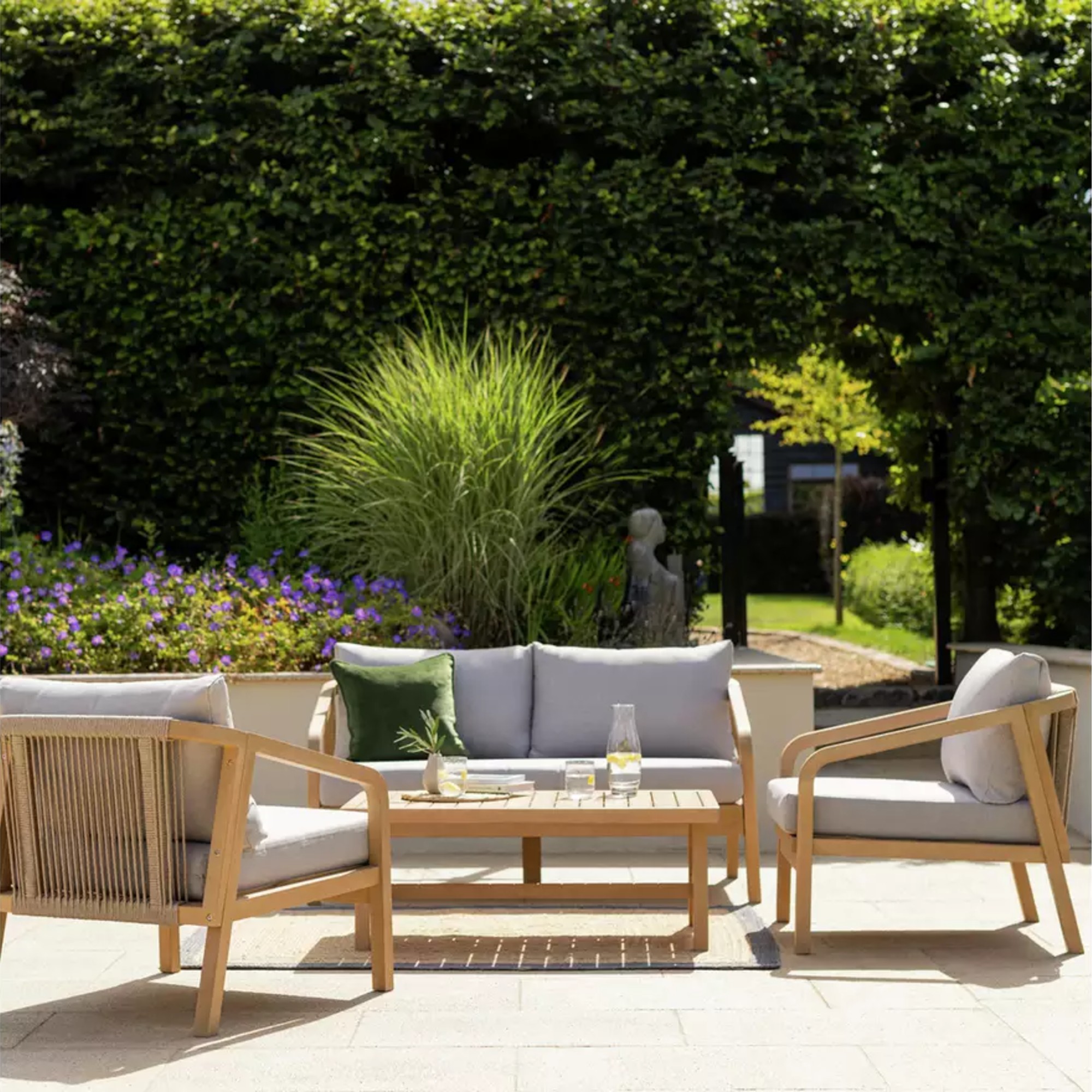 Habitat Hania 4 Seater Wooden Garden Sofa Set in a garden