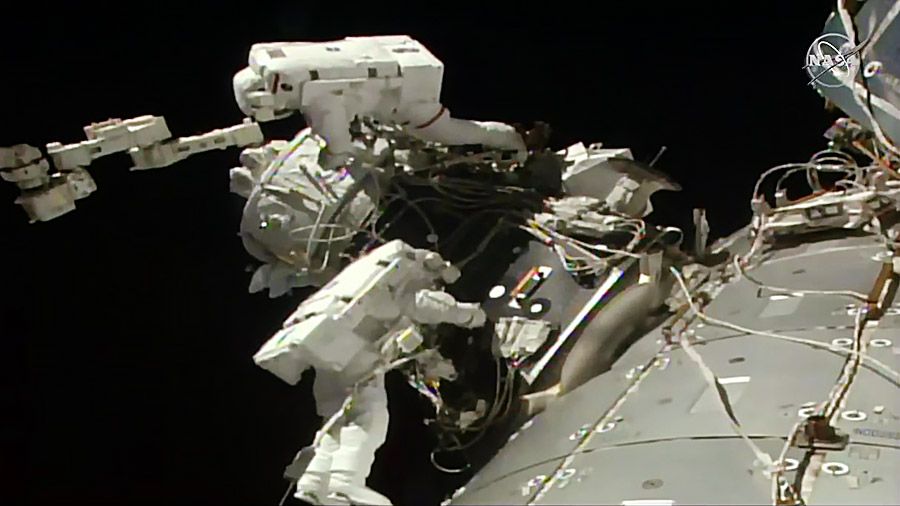 Spacewalking Astronauts Install Parking Spot for Private Spaceships at Space Station