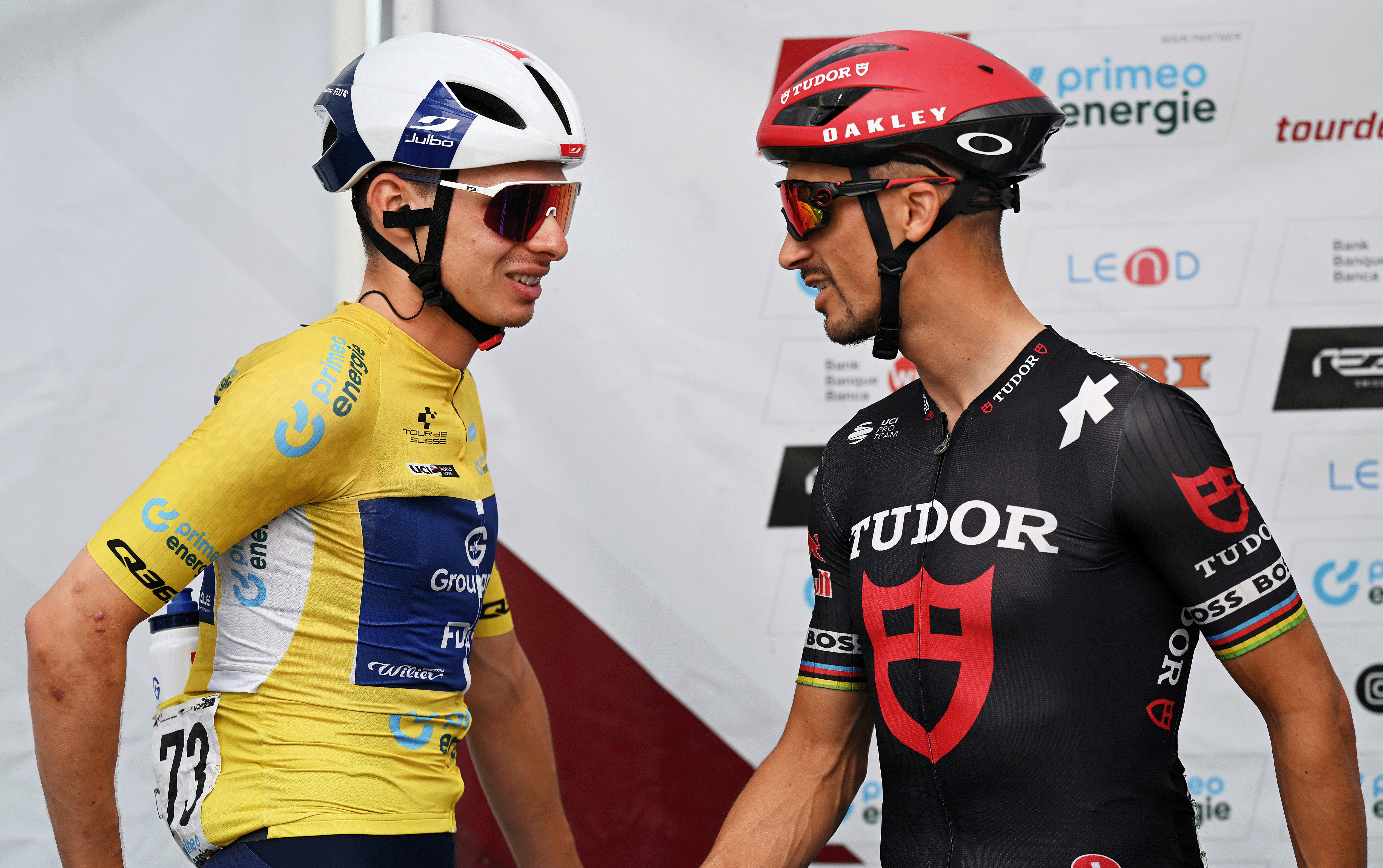 LA PUNT, SWITZERLAND - JUNE 19: (L-R) Romain Gregoire of France and Team Groupama - FDJ - Yellow leader jersey and Julian Alaphilippe of France and Team Tudor Pro Cycling prior to the 88th Tour de Suisse, Stage 5 a 183.8km stage from La Punt to Santa Maria in Calanca 941m / #UCIWT / on June 19, 2025 in La Punt, Switzerland. (Photo by Tim de Waele/Getty Images)