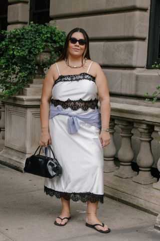 woman in lace trimmed slip skirt and top