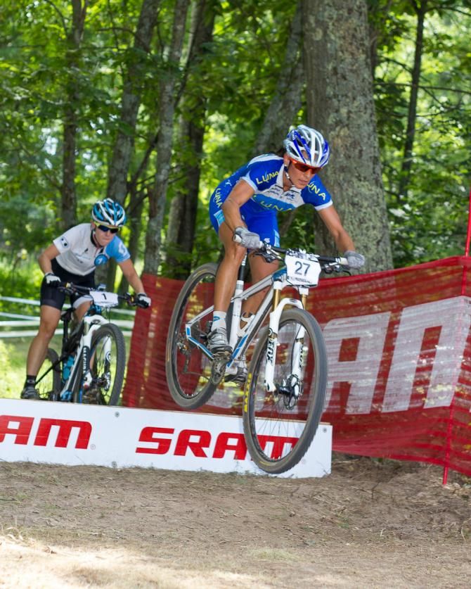 Katerina Nash and Chloe Woodruff over the ramp.