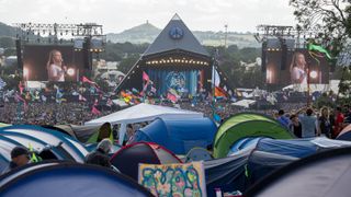 Tents and the Pyramid Stage at Glastonbury Festival