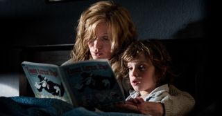 A mother reads to her son in The Babadook