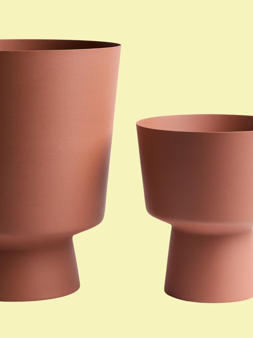 A set of two metal terracotta plant pots from H&amp;amp;M