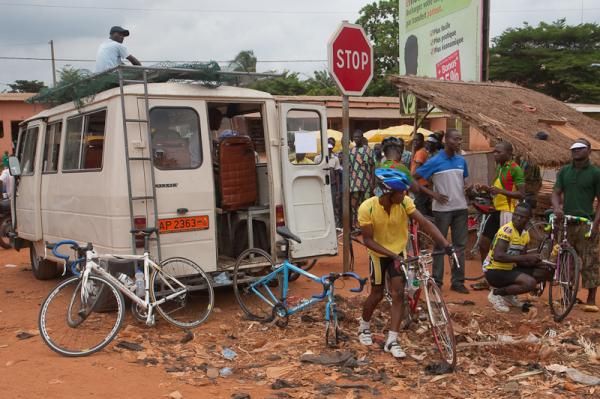 The Benin national team unloads their bikes from the team van