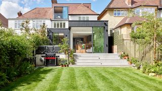 A semi detached home renovation and extension with lush lawn in front