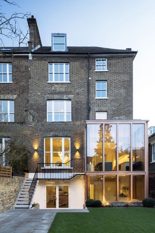 Glass box double storey extension