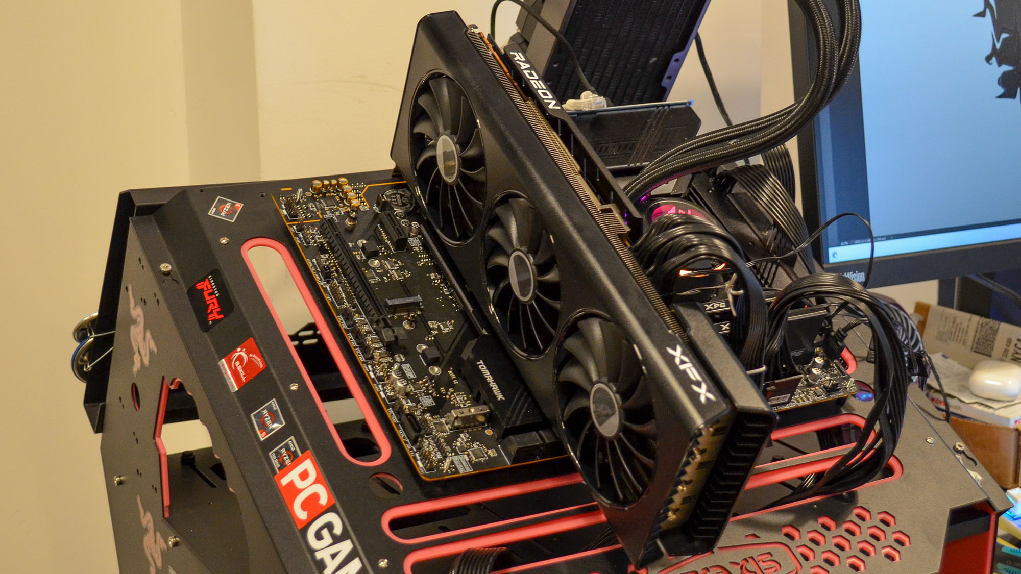 An AMD Radeon RX 7700 XT slotted into a test bench
