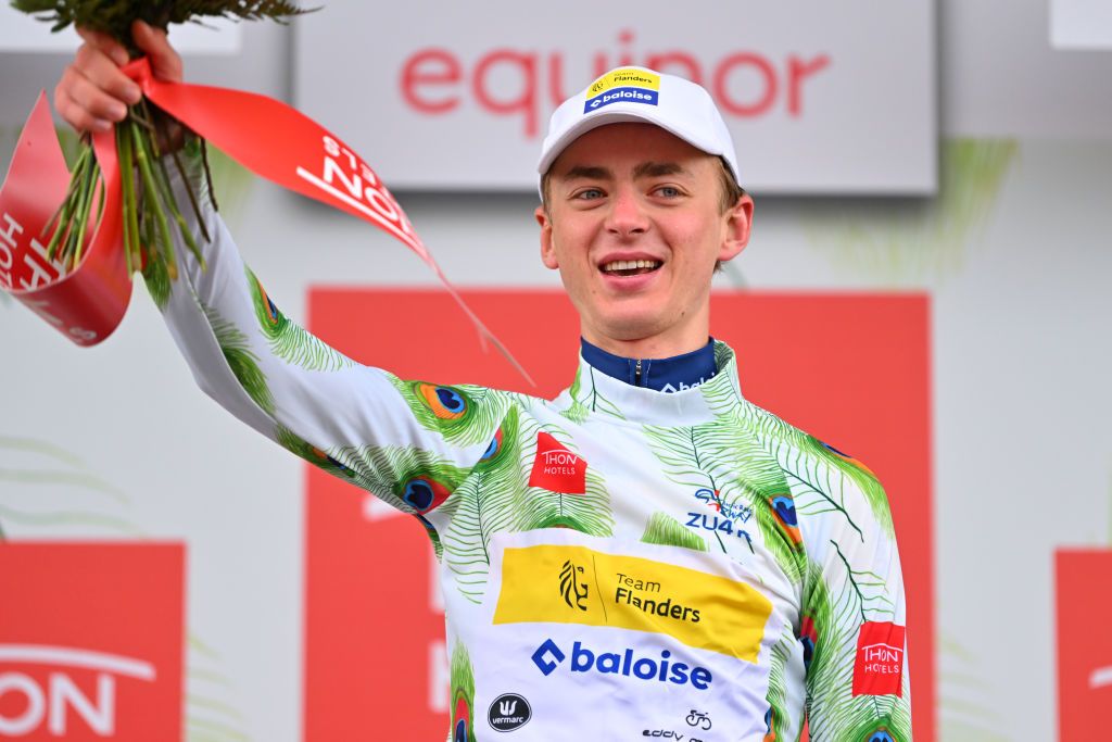 HAMMERFEST NORWAY AUGUST 18 Noah Vandenbranden of Belgium and Team FlandersBaloise Polka Dot Mountain Jersey celebrates at podium during the 10th Arctic Race of Norway Stage 2 a 1534km stage from Alta to Hammerfest on August 18 2023 in Hammerfest Norway Photo by Luc ClaessenGetty Images