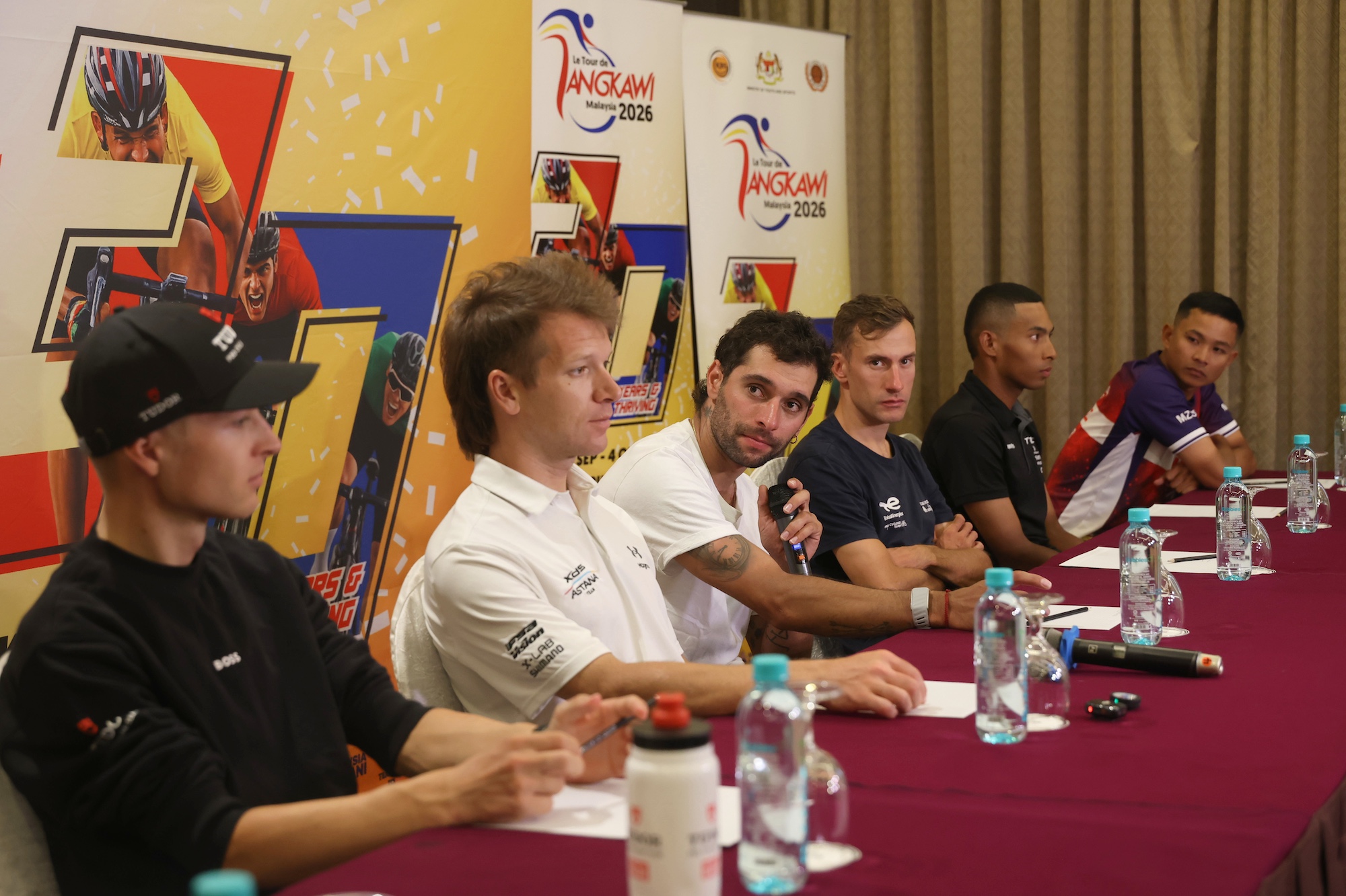 Tour de Langkawi 2026 pre-race press conference with  (L-R) Lennart Jasch (Tudor), Aaron Gate (XDS Astana),  Fernando Gaviria (Caja Rural-Seguros RGA), Geoffrey Bouchard (Total Energies), Aiman Rosli (Terengganu) and Muhammad Izzat Hilmi (Malaysia Pro Cycling)