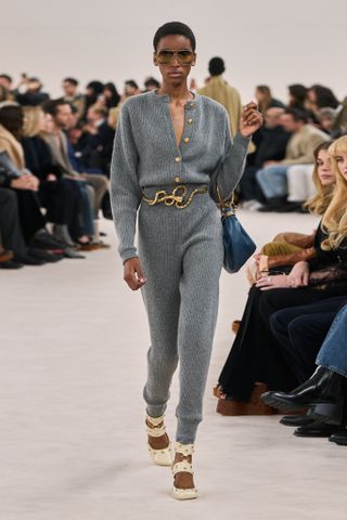 chloe model in grey knit top and grey sweatpants