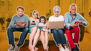 Multi-generational family sitting on a sofa and all using an internet-connected device