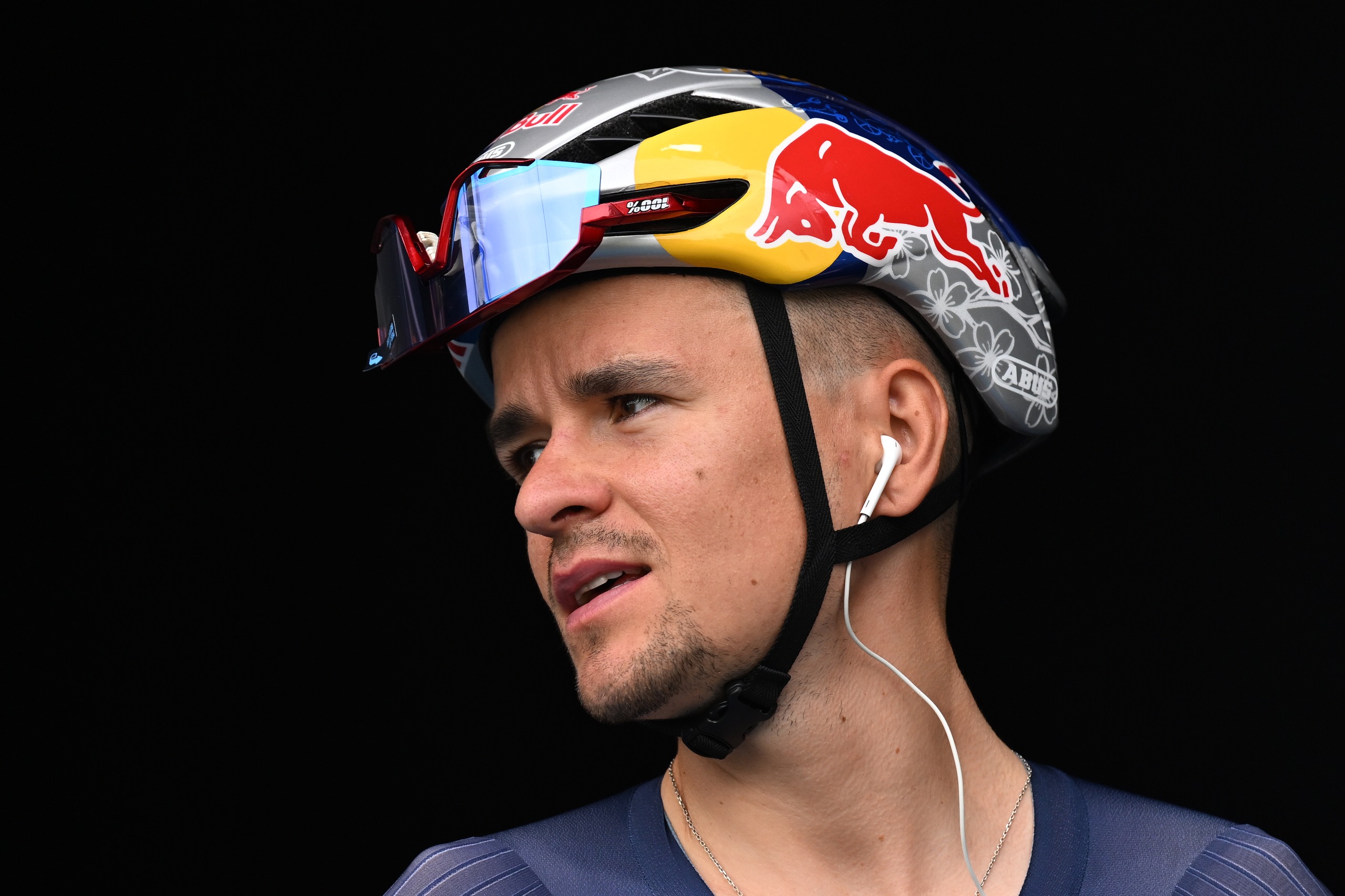 Tom Pidcock in a Red Bull helmet