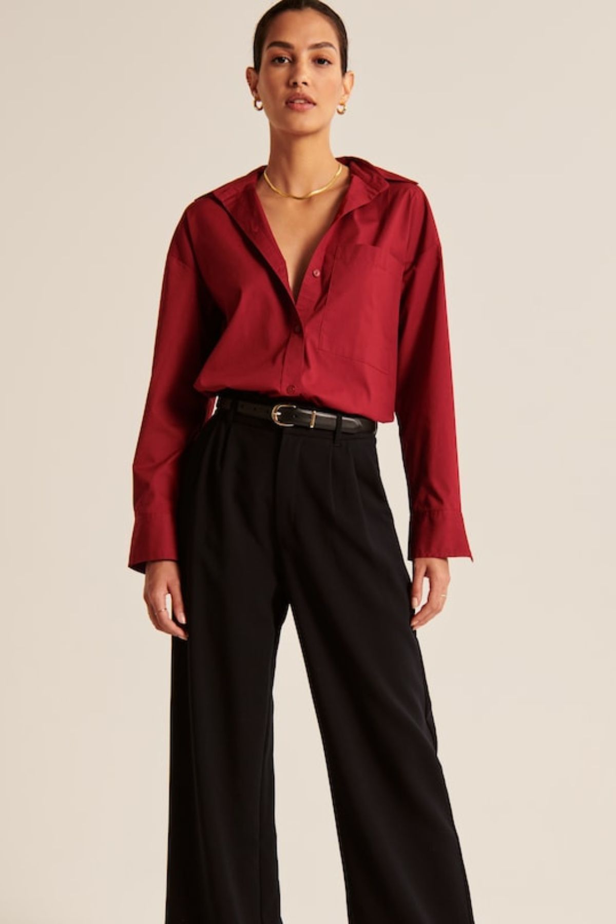 model wearing Abercrombie & Fitch red button down shirt