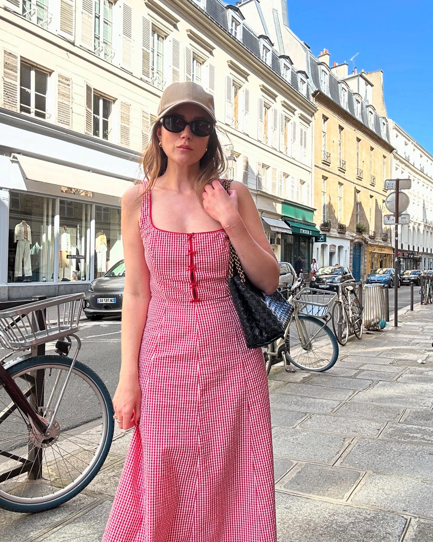 Allyson Payer wearing a gingham dress.