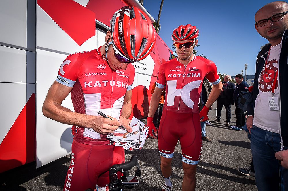 Simon Spilak and Alexander Kristoff interact with fans