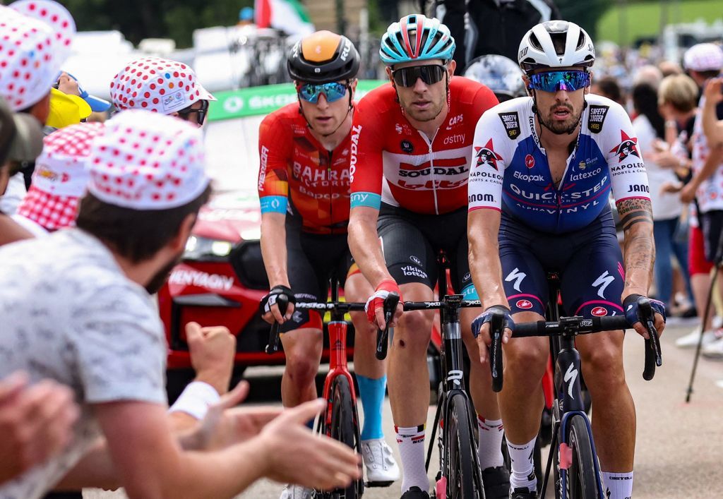 QuickStep Alpha Vinyl Teams Italian rider Mattia Cattaneo R cycles ahead of Lotto Soudal teams Belgian rider Frederik Frison 2nd R and Bahrain Victorious teams British rider Fred Wright L in a breakaway during the 8th stage of the 109th edition of the of the Tour de France cycling race 1863 km between Dole in eastern France and Lausanne in Switzerland on July 9 2022 Photo by Thomas SAMSON AFP Photo by THOMAS SAMSONAFP via Getty Images