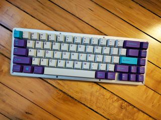 A custom WhiteFox keyboard, a favorite among mech enthusiasts.