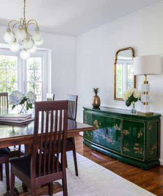Dining room with green vintage sideboard