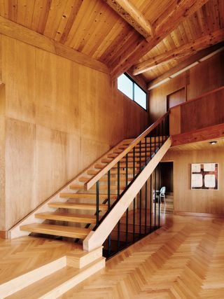 timber staircase inside Space Invader house