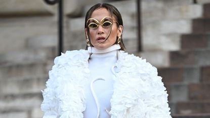 Jennifer Lopez in a coat made from real rose petals at