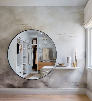 small dressing room with large mirror by K Interiors