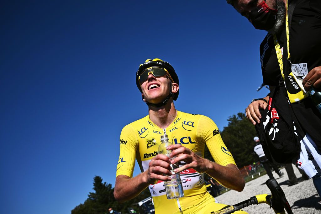 PLANCHE DES BELLES FILLES FRANCE JULY 08 Tadej Pogacar of Slovenia and UAE Team Emirates Yellow Leader Jersey celebrates winning and cools down to refresh itself during the 109th Tour de France 2022 Stage 7 a 1763km stage from Tomblaine to La Super Planche des Belles Filles 1141m TDF2022 WorldTour on July 08 2022 in Planche des Belles Filles France Photo by AnneChristine Poujoulat PoolGetty Images