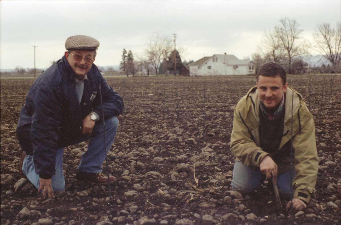 Copy-of-CAYUSE-ARCHIVE_Christophe-Baron-plants-vines-in-Walla-Walla-Valley-c1997-Dad-planting.jpg