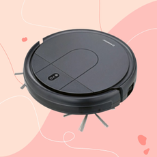 Lidl robot vacuum on a pink background.